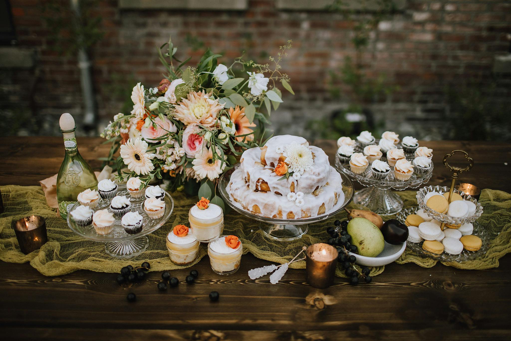 Delicious dessert table spread with flowers