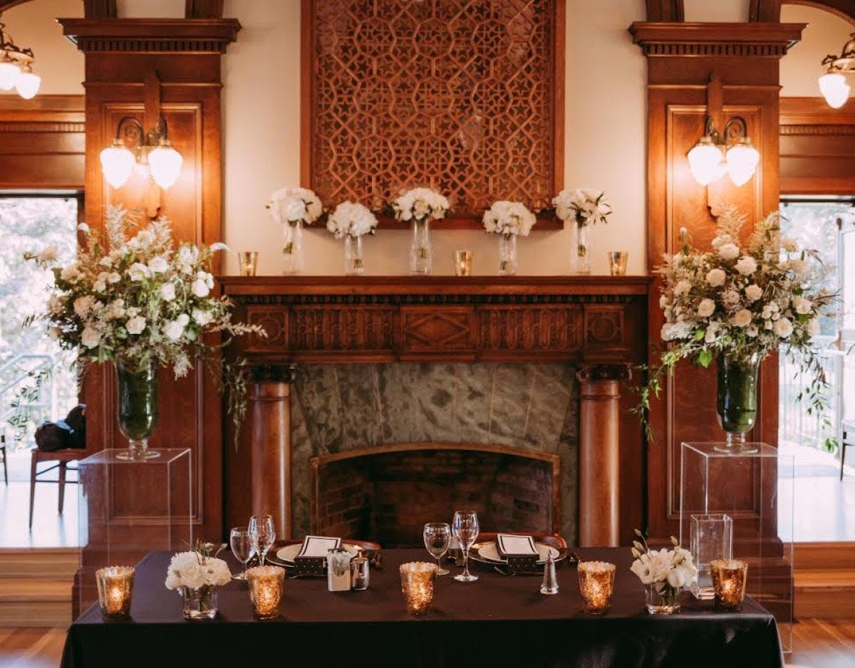 empress hotel fire place with the light florals contrasting against the dark background