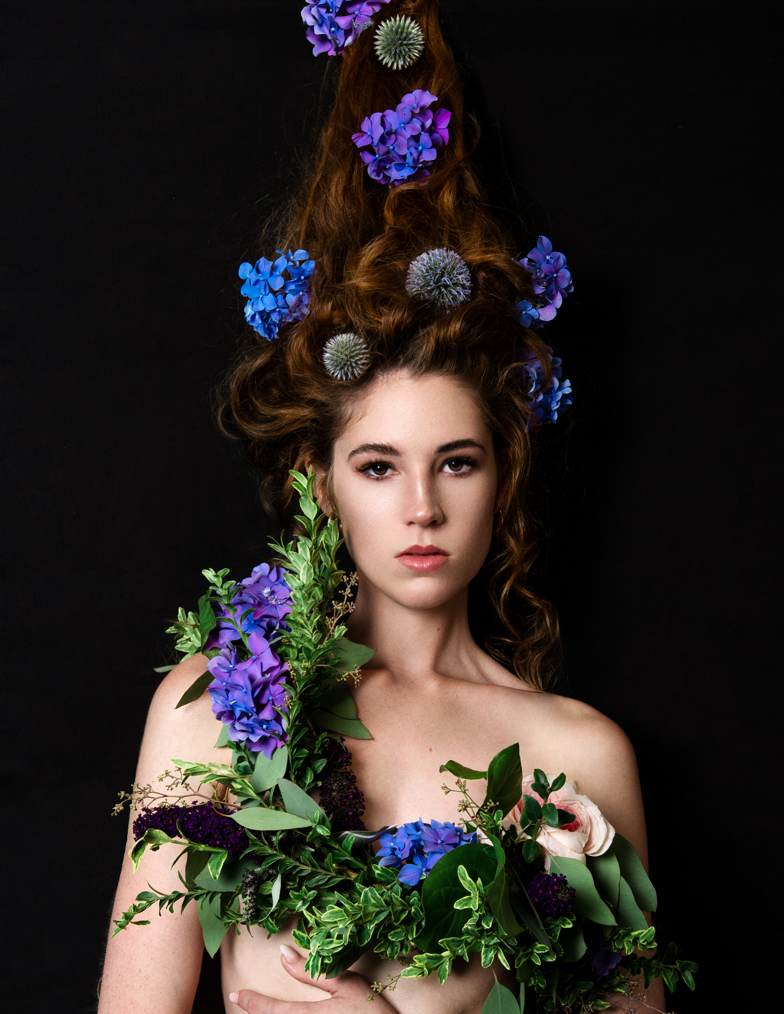 model covered in floral art
